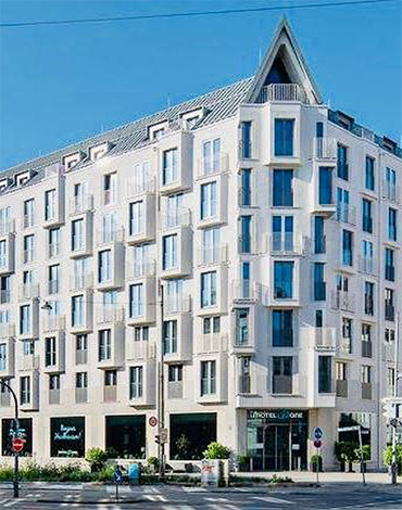 Neubau eines Bürogebäudes, Hotels und Wohngebäudes mit Tiefgarage ehem. Holzkontor in München