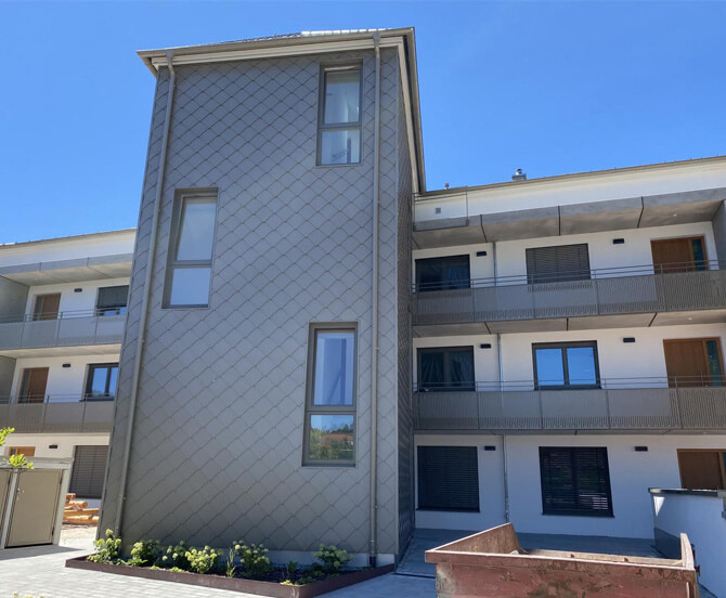 Neubau eines Mehrfamilienhauses am Chiemsee Front