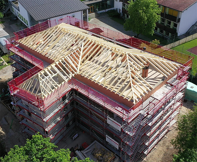 Neubau eines Mehrfamilienhauses am Chiemsee Luftaufnahme