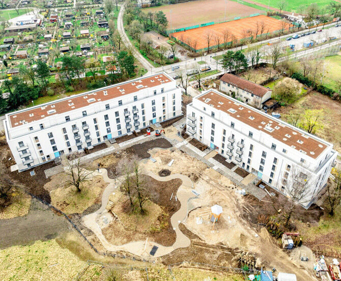Neubau von 4 Mehrfamilienhäusern Luftaufnahme weit